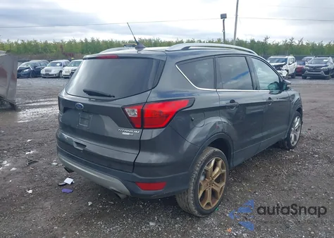2019 Ford Escape Titanium из США, поврежденный, VIN 1FMCU9J9XKUB42852